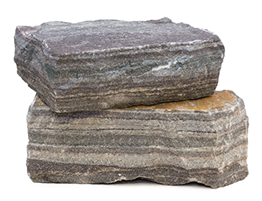 two bricks of ashlar stone stacked on top of each other