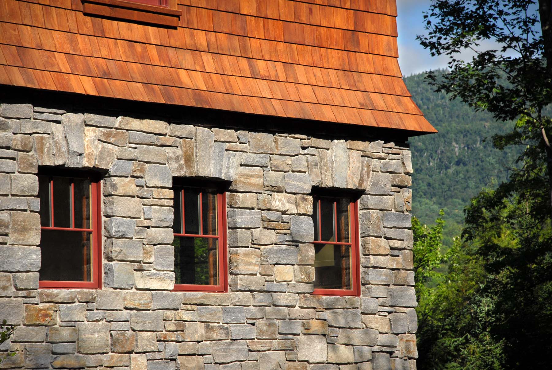 Residential Home with exterior of 1763 granite building stone veneer