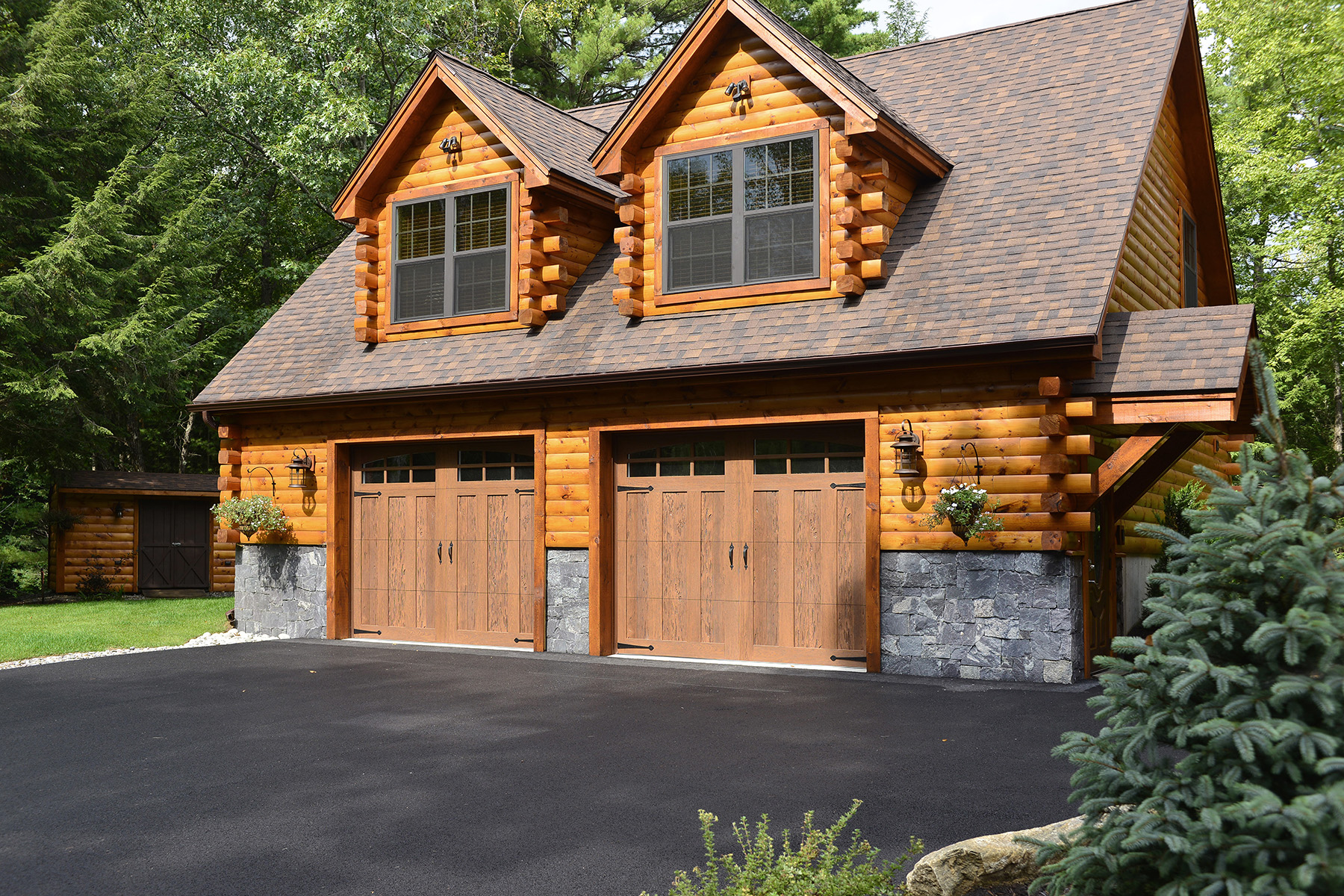 log garage house and driveway