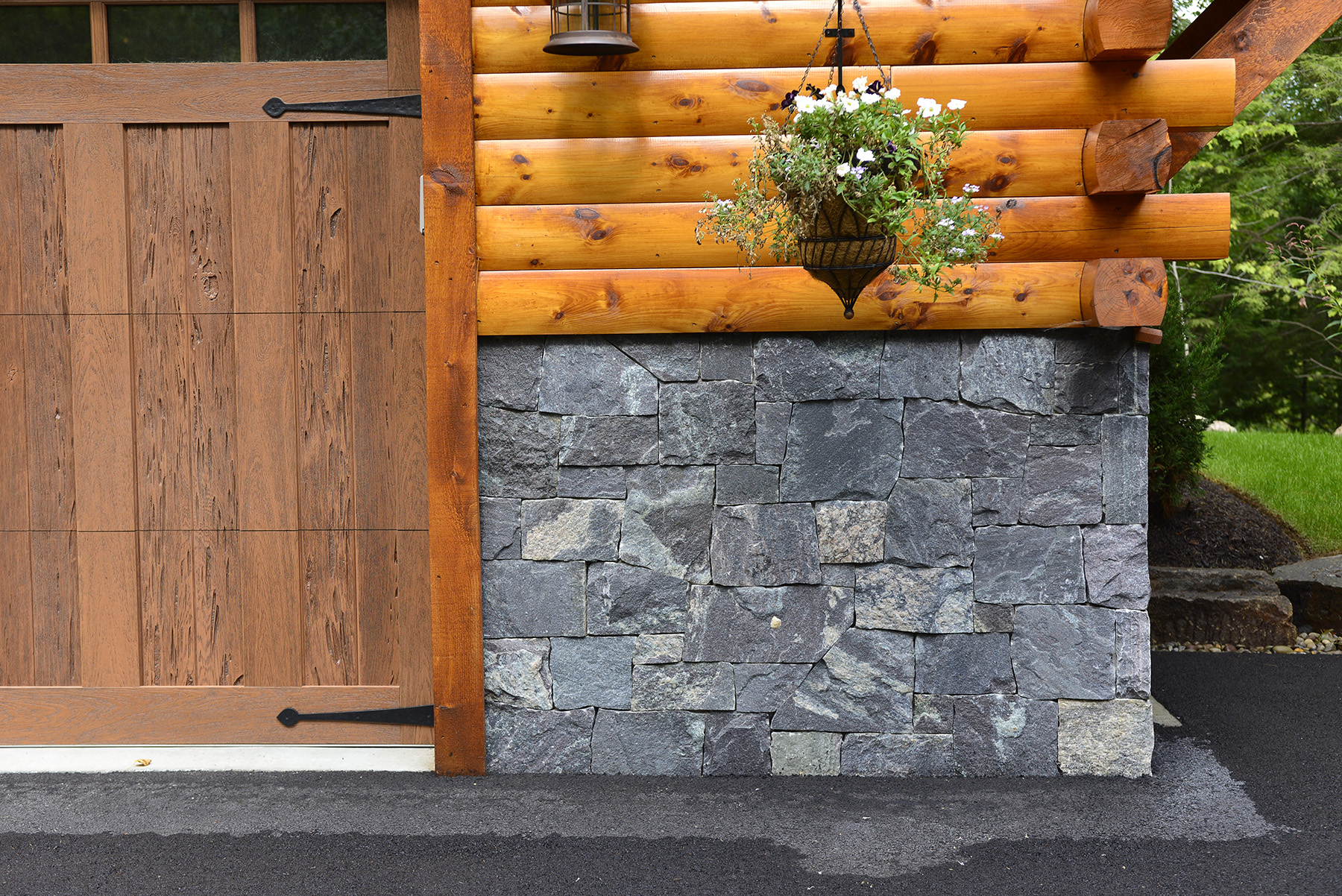 stone detailing with hanging flowers