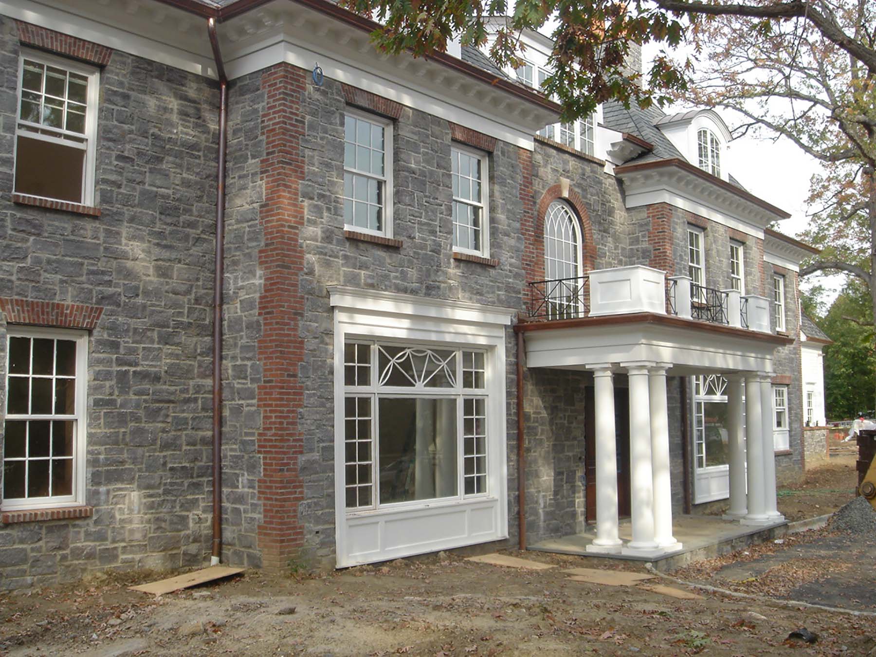 residential home with corinthian granite natural stone exterior
