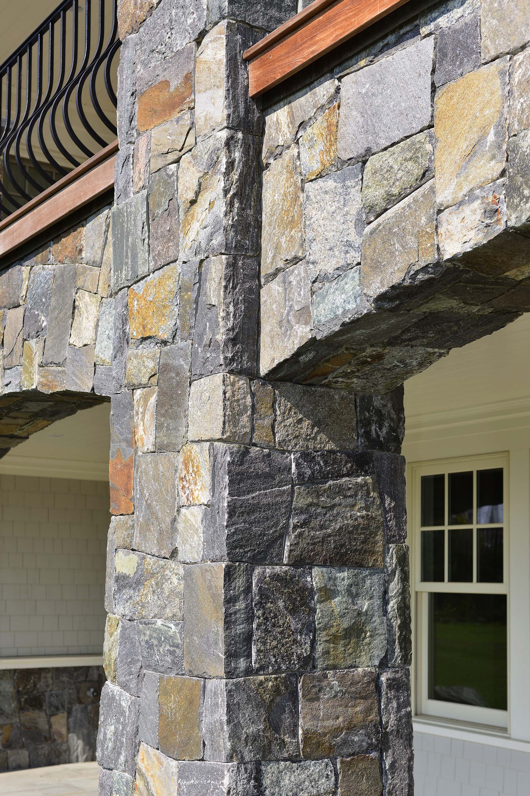 saratoga granite mosaic natural stone column and archway outside