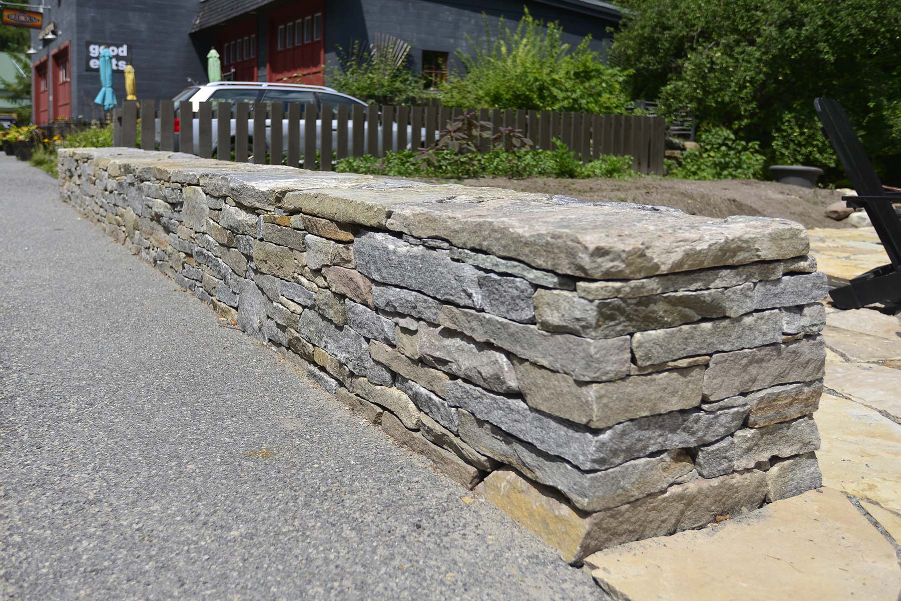 natural stone Ticonderoga granite wall outside business
