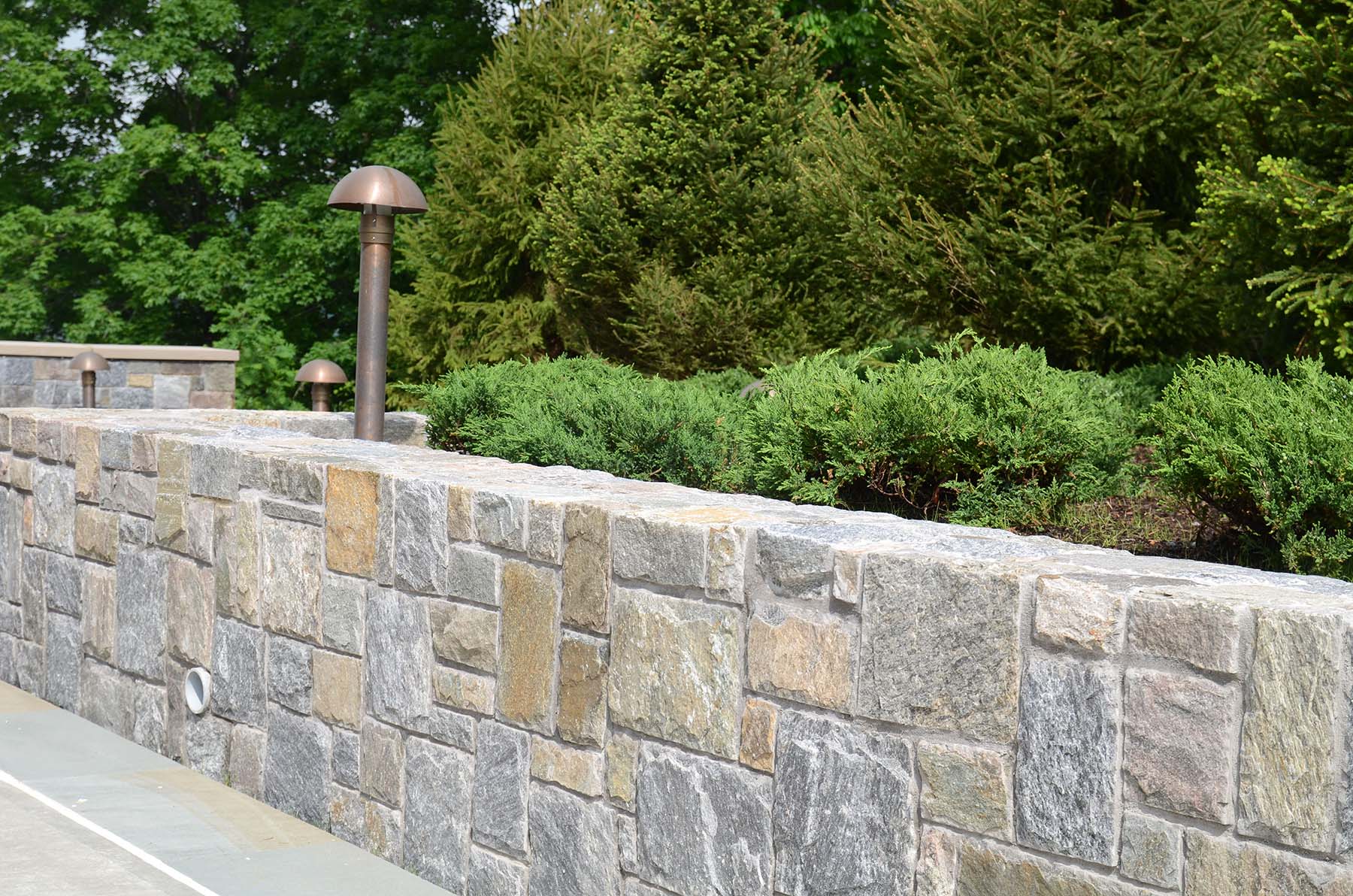 Ticonderoga granite natural stone wall in park