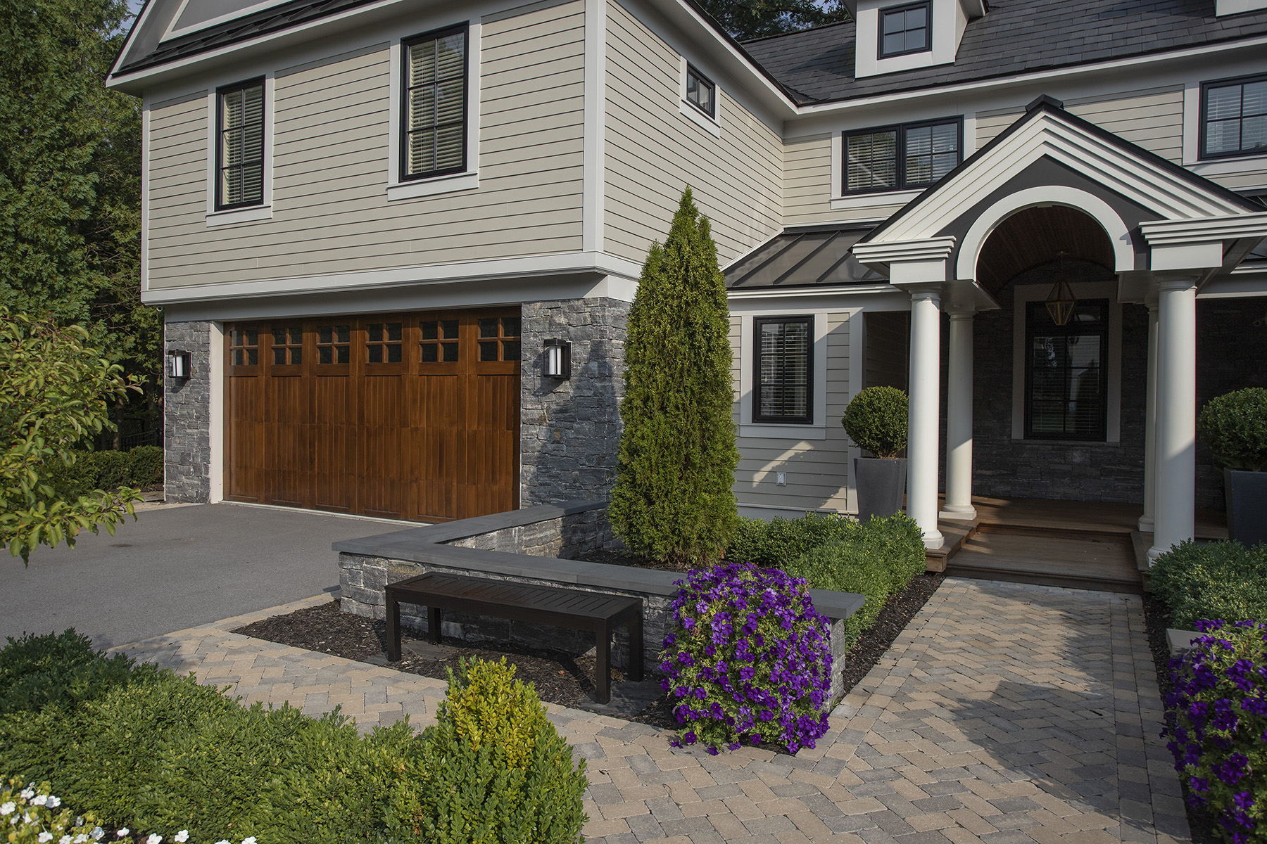 stone garage with wooden doors