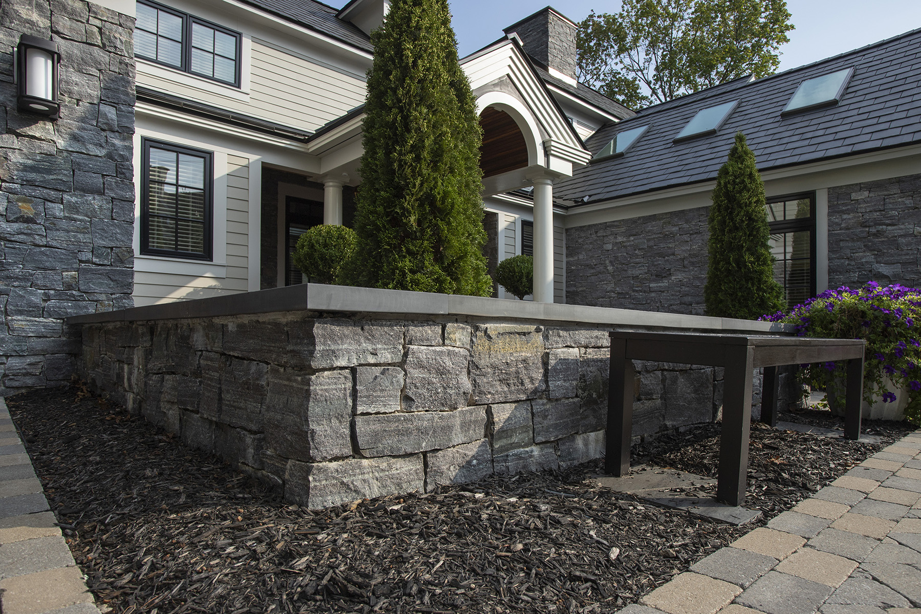 garden with short stone wall