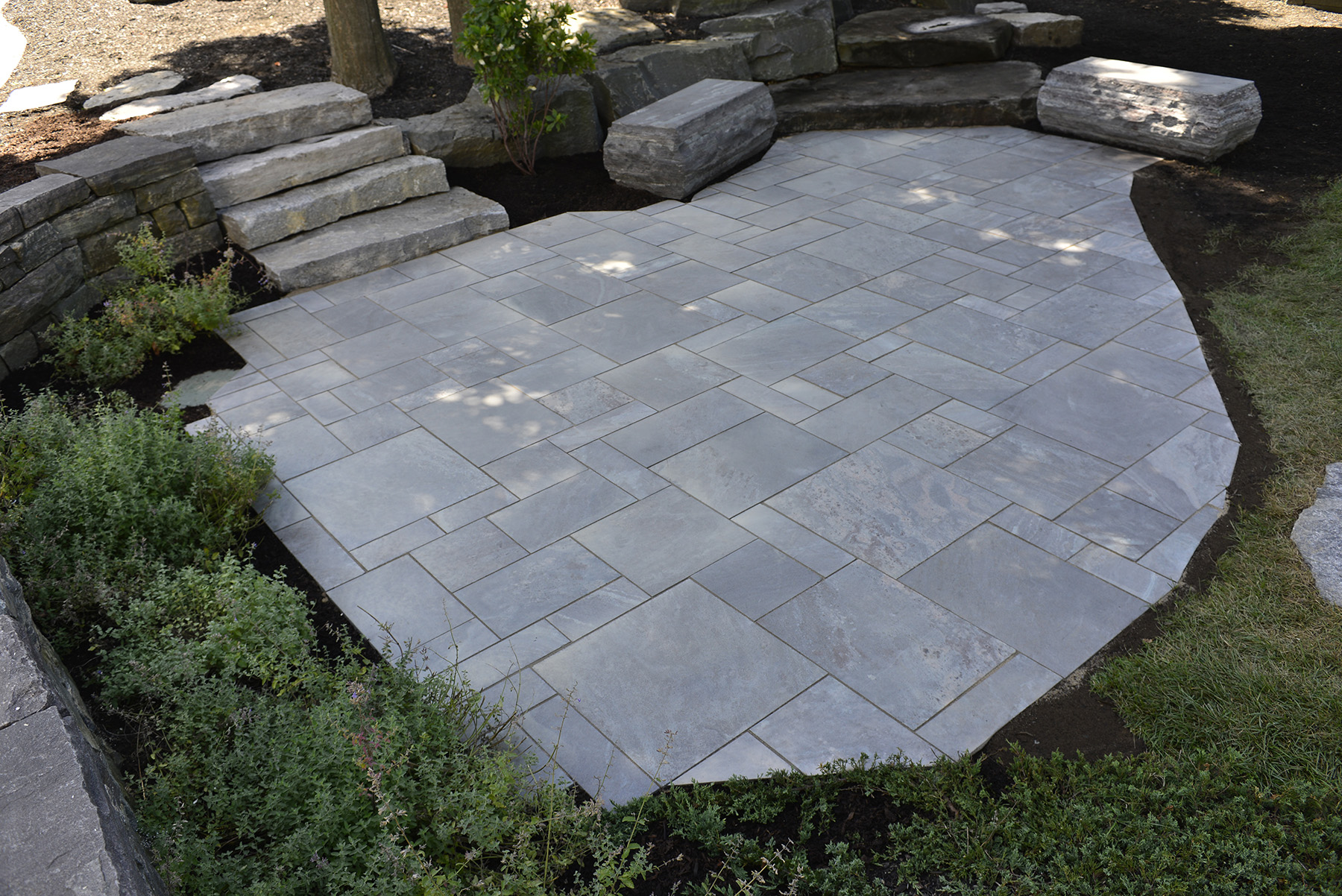 Dimensional stone with landscaping stone