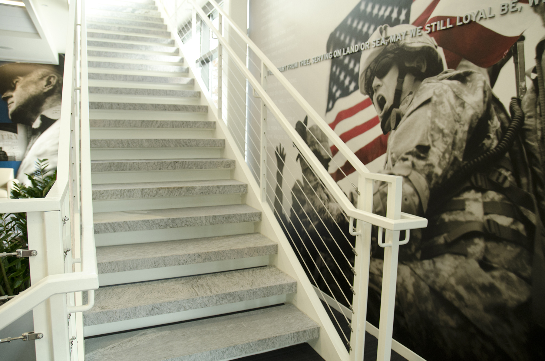 stone stairs with solider art in background
